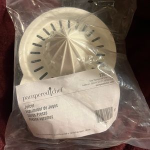 New Pampered Chef juicer still in the package with instructions